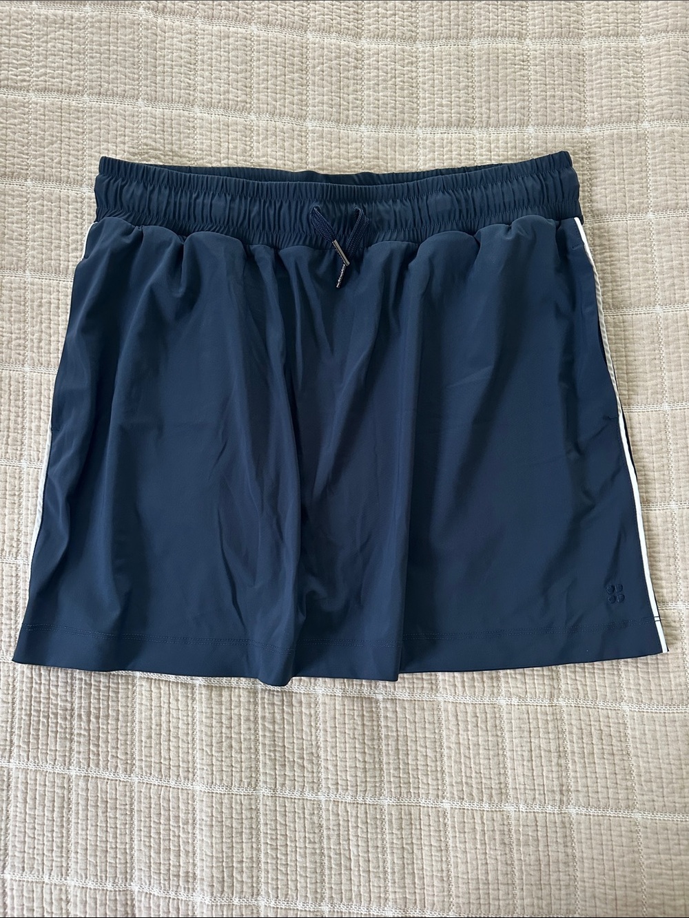 Sweaty Betty Navy Athletic Skirt with navy Drawcord